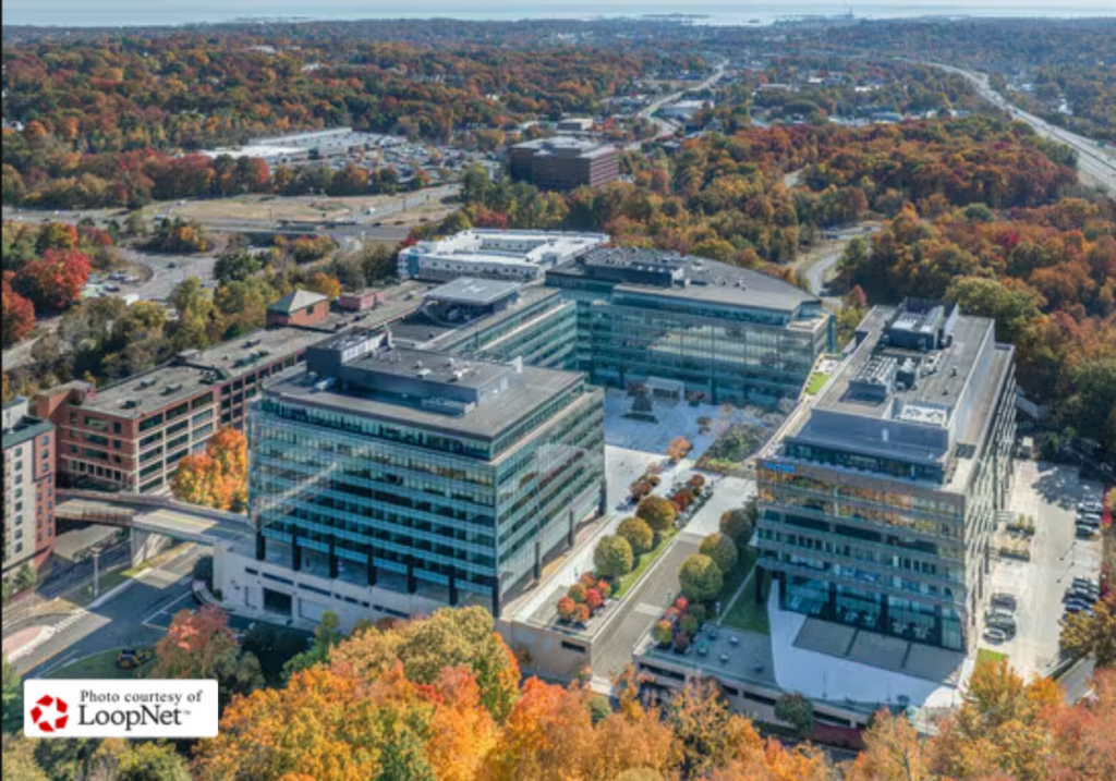 The expansive contemporary glass and steel exterior facade of 901 Main Avenue Norwalk, part of The Towers corporate campus.