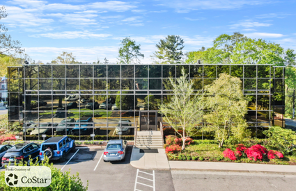 Exterior glass panel facade of 315 Post Road West, commercial real estate in Westport CT