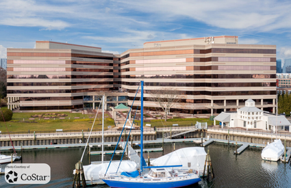 Modern glass exterior of 333 Ludlow Street waterfront office building in Stamford, Connecticut.